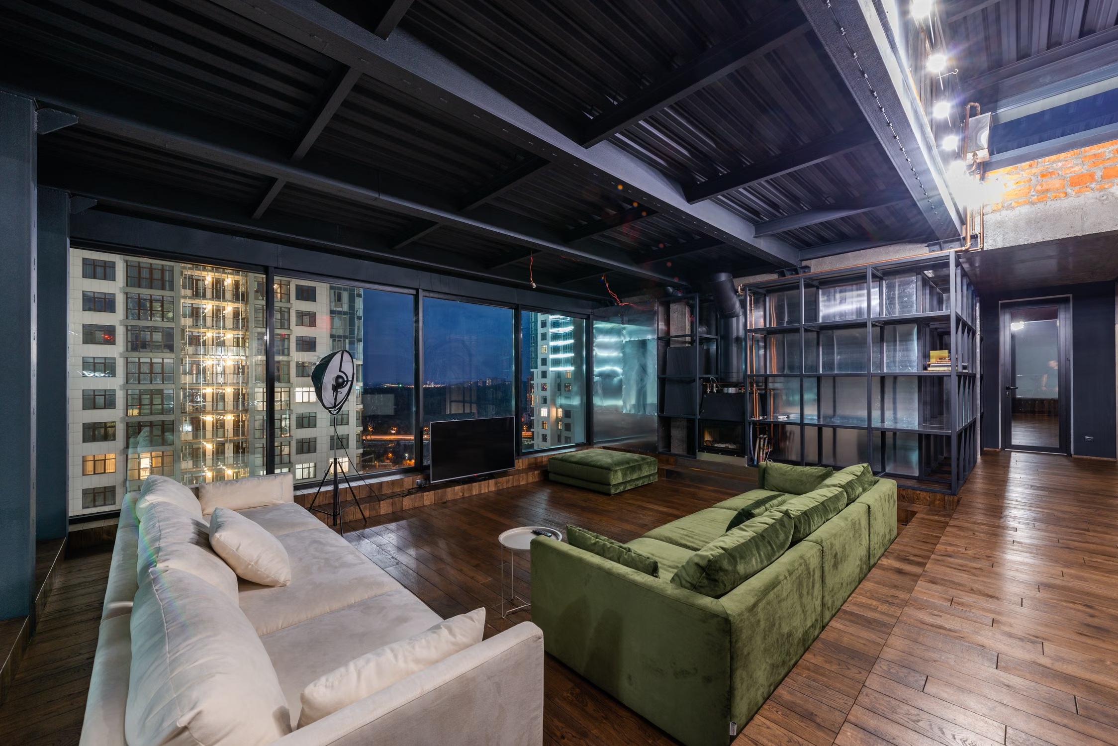 Wide luxury loft living room with panoramic windows
